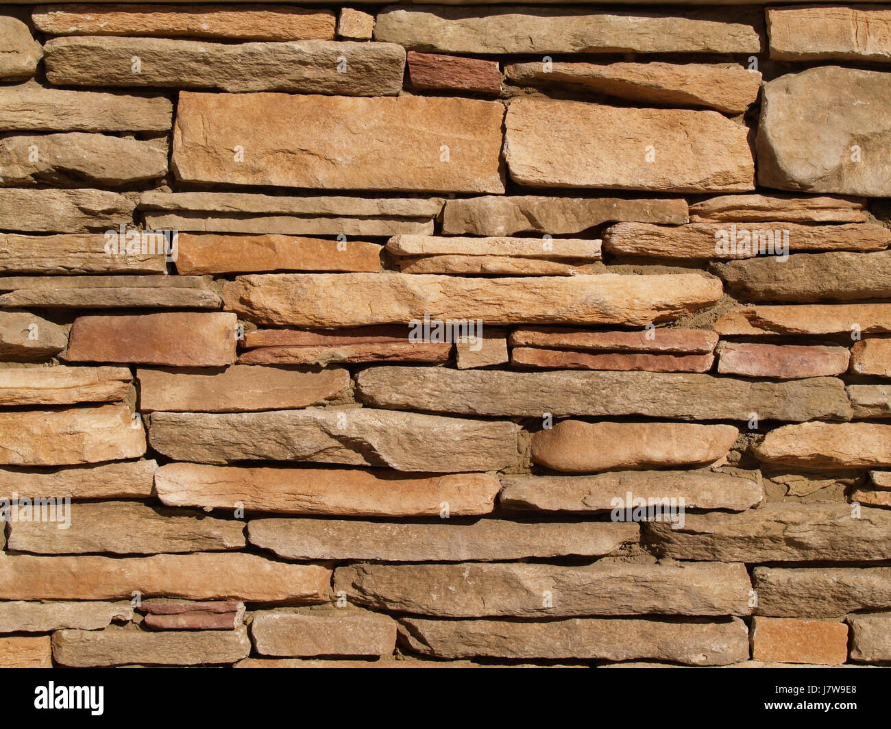 stone brown brownish brunette wall style of construction architecture Stock Photo