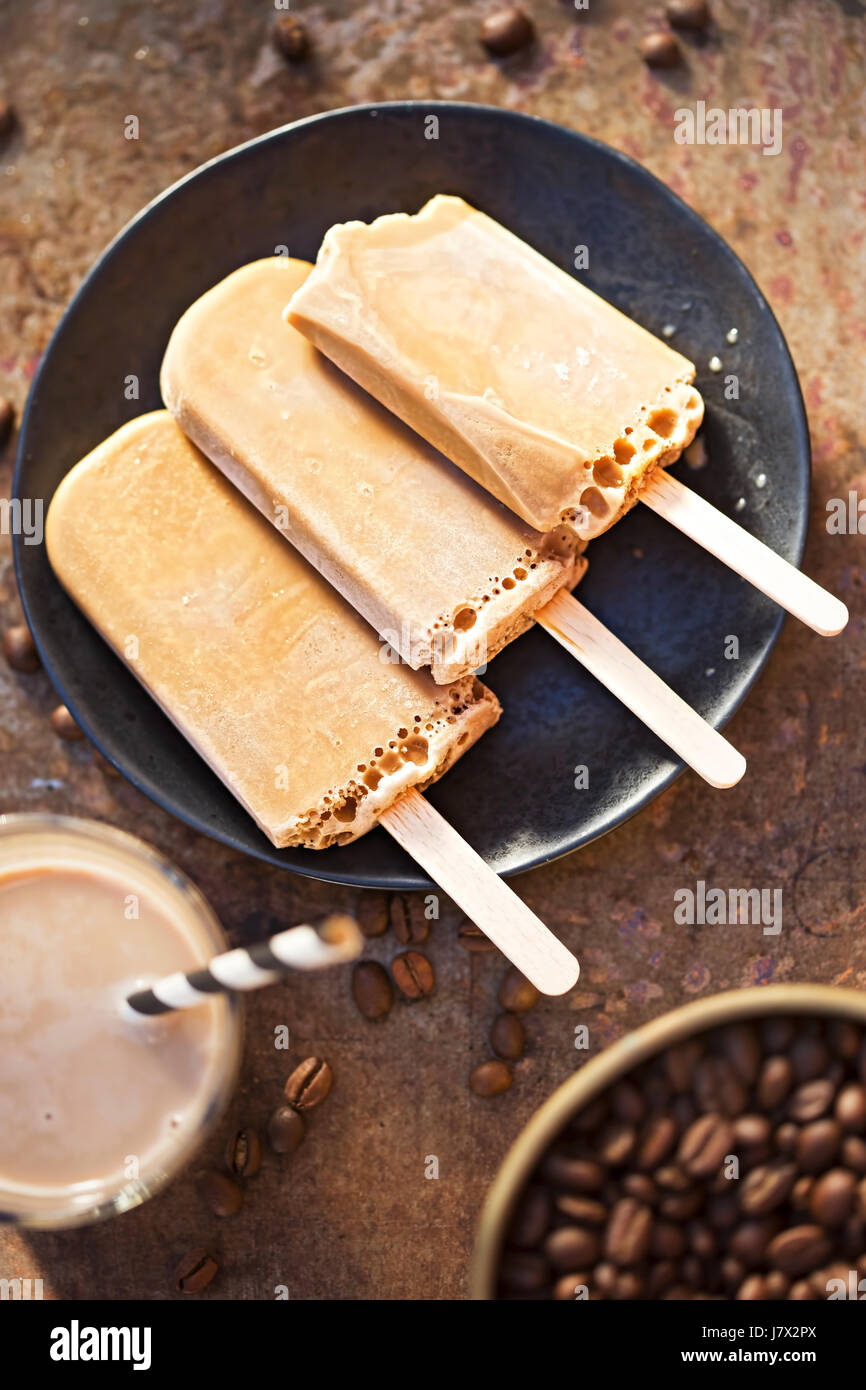Iced latte coffee ice cream popsicles Stock Photo Alamy