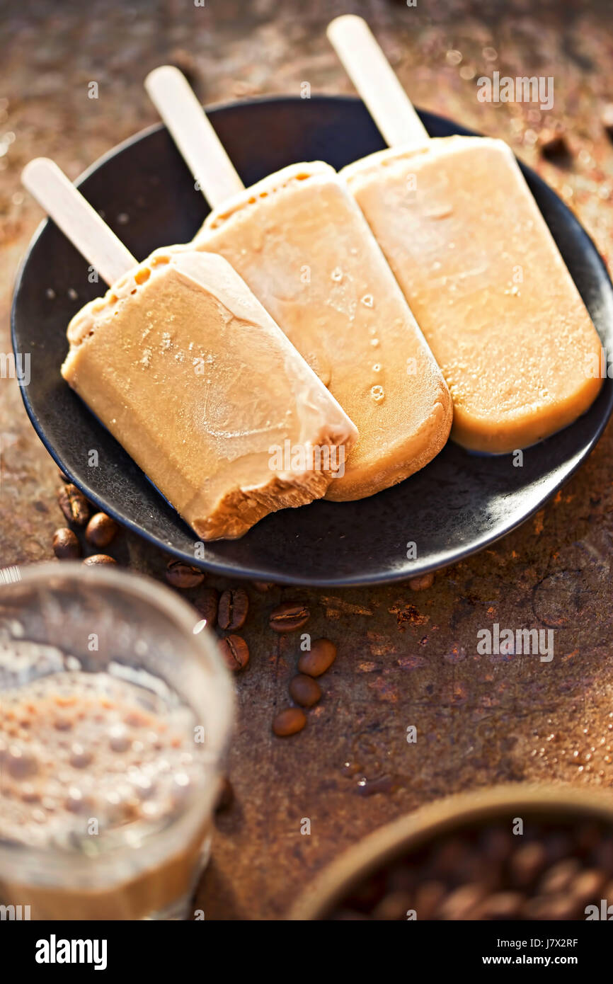 Iced latte coffee ice cream popsicles Stock Photo Alamy