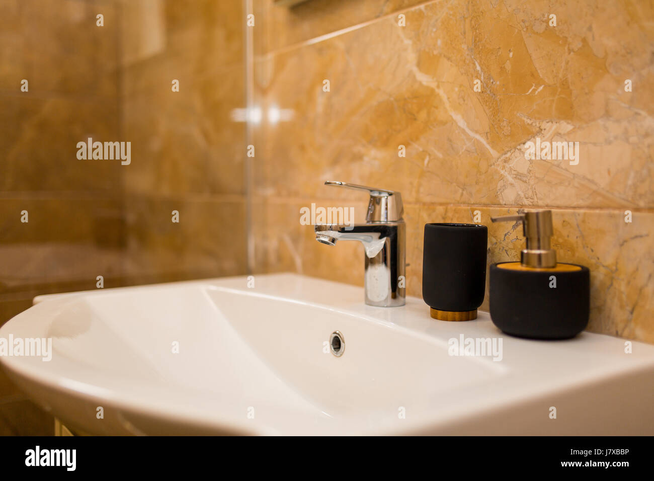 Washbasin in the bathroom. Plumbing in the bathroom. The interio Stock ...