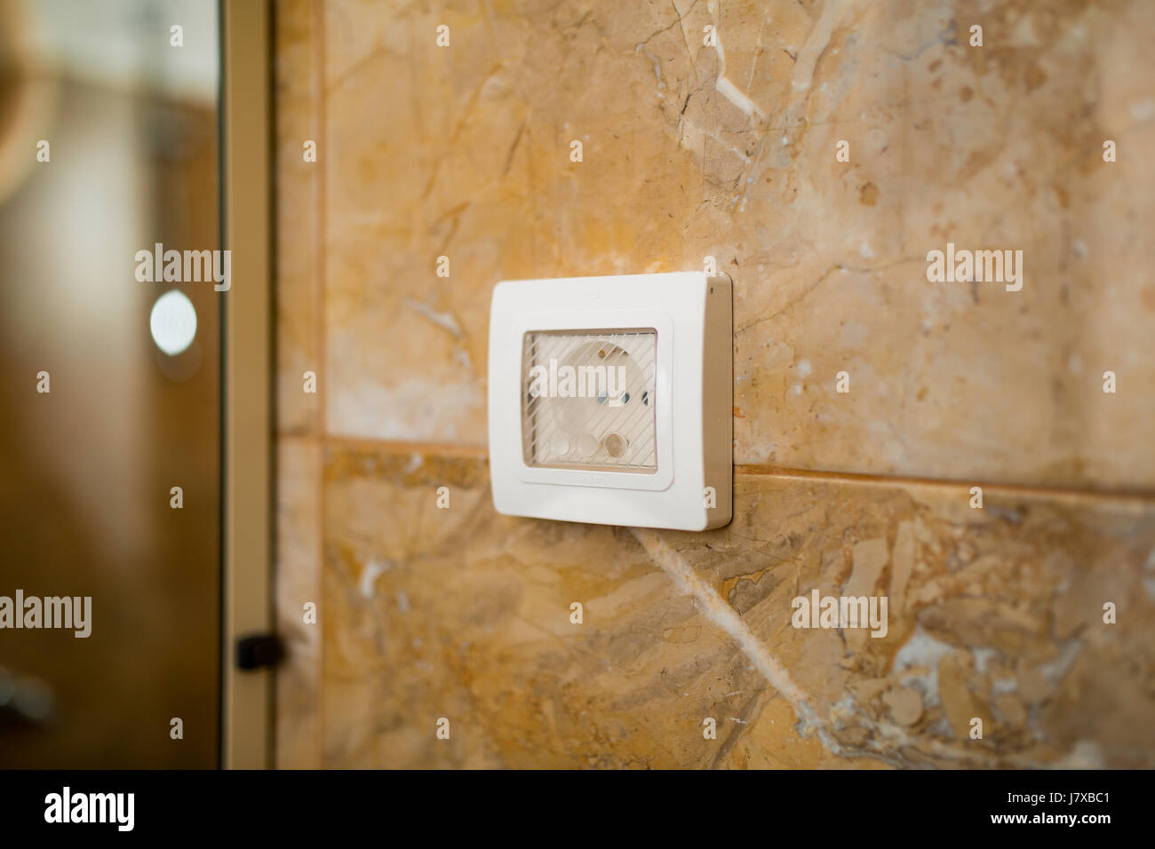 The socket in the bathroom with waterproof. Electrical Engineeri Stock