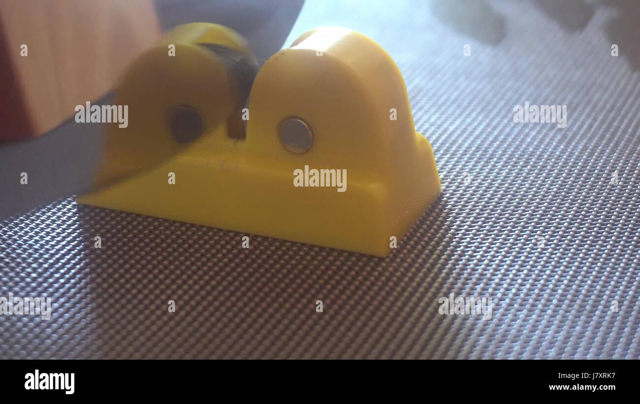 Knife and sharpener for a knife in the hands of man. Manual sharpening