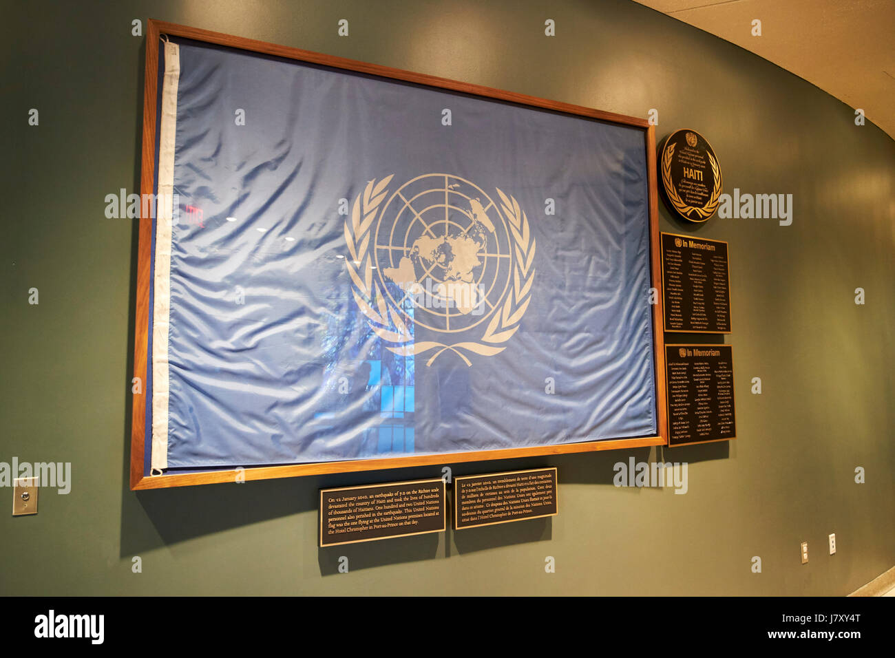 UN framed haiti earthquake flag on display at the United Nations headquarters building New York City USA Stock Photo