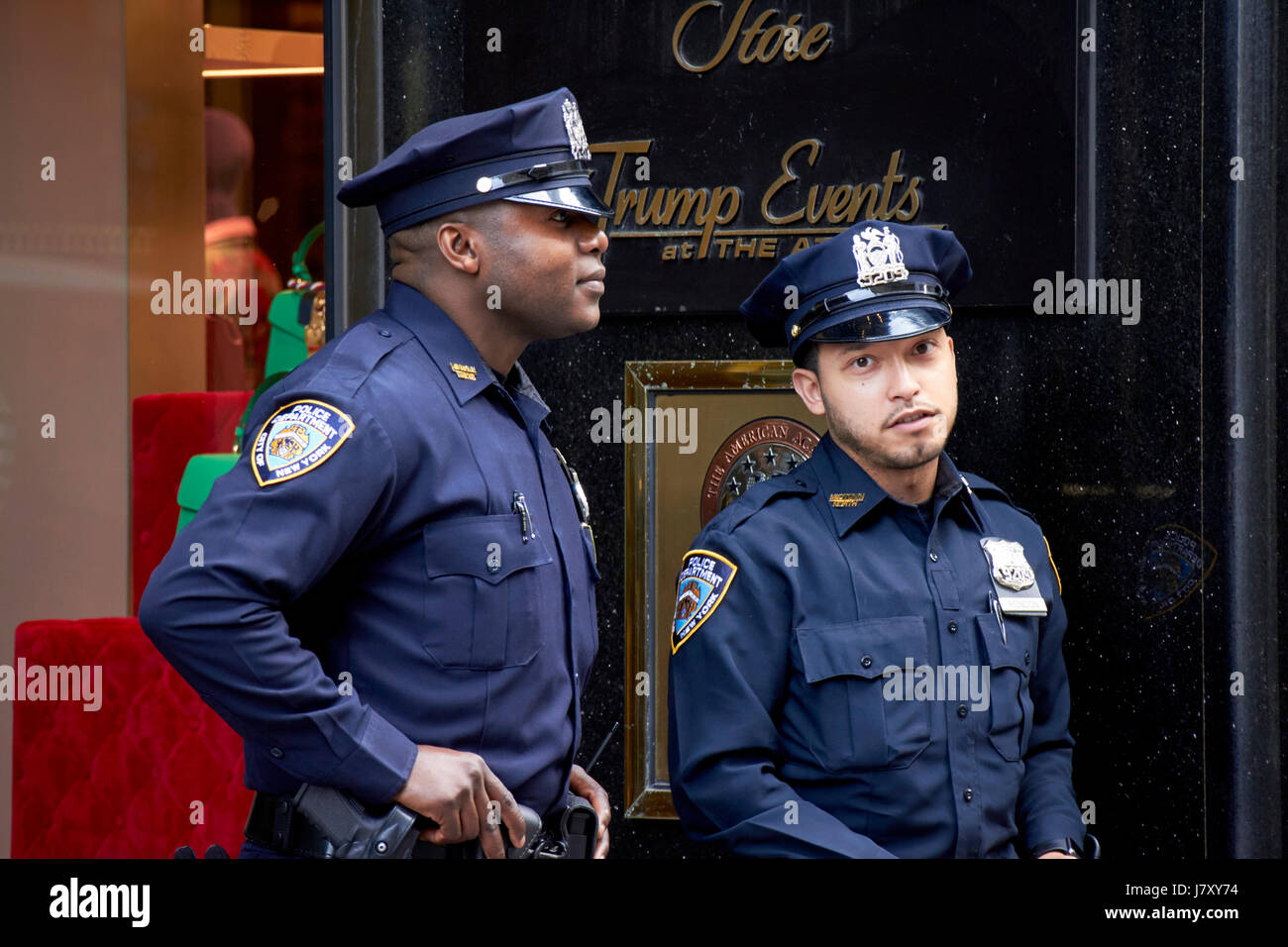 nypd protective security detail outside entrance to trump tower manhattan New York City USA Stock Photo