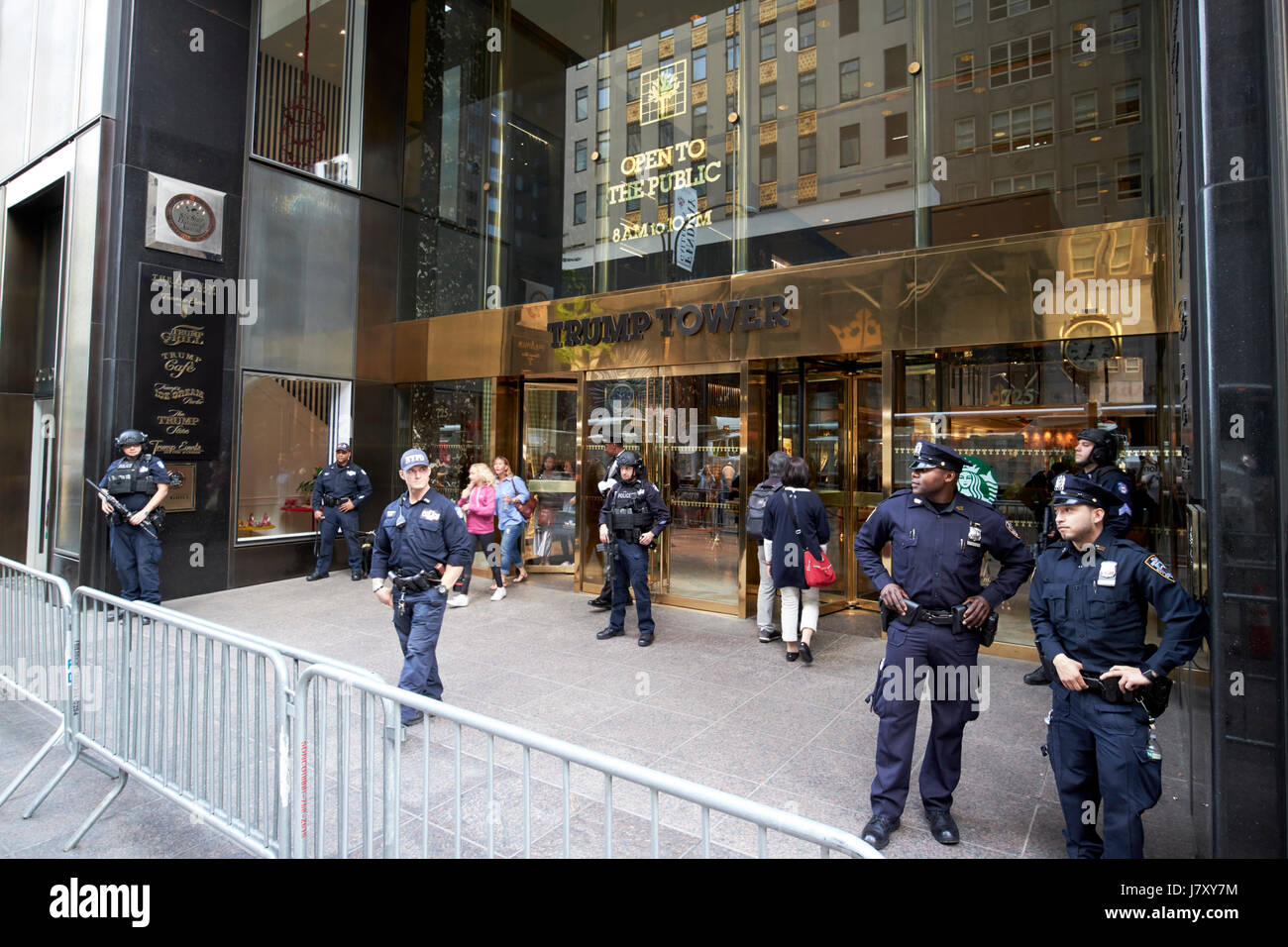 nypd protective security detail and screening cordon outside entrance to trump tower manhattan New York City USA Stock Photo
