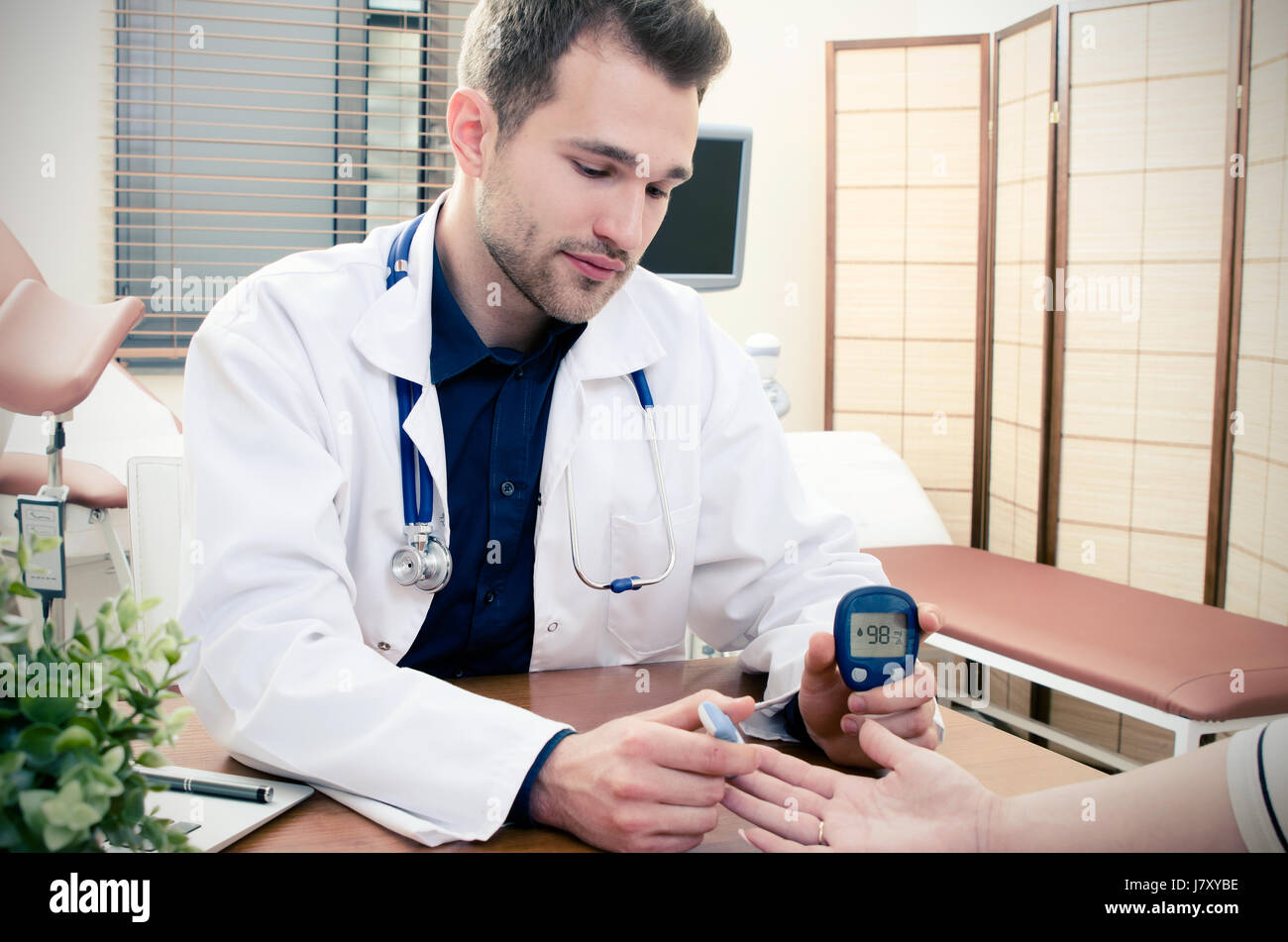 Doctor measuring of blood sugar for diabetes patient. diabetes blood