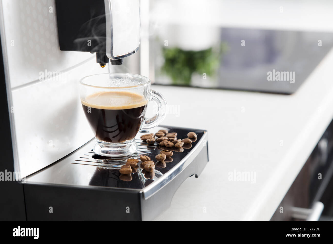 Home professional coffee machine with espresso cup. coffee machine espresso kitchen cup hot italian white concept Stock Photo