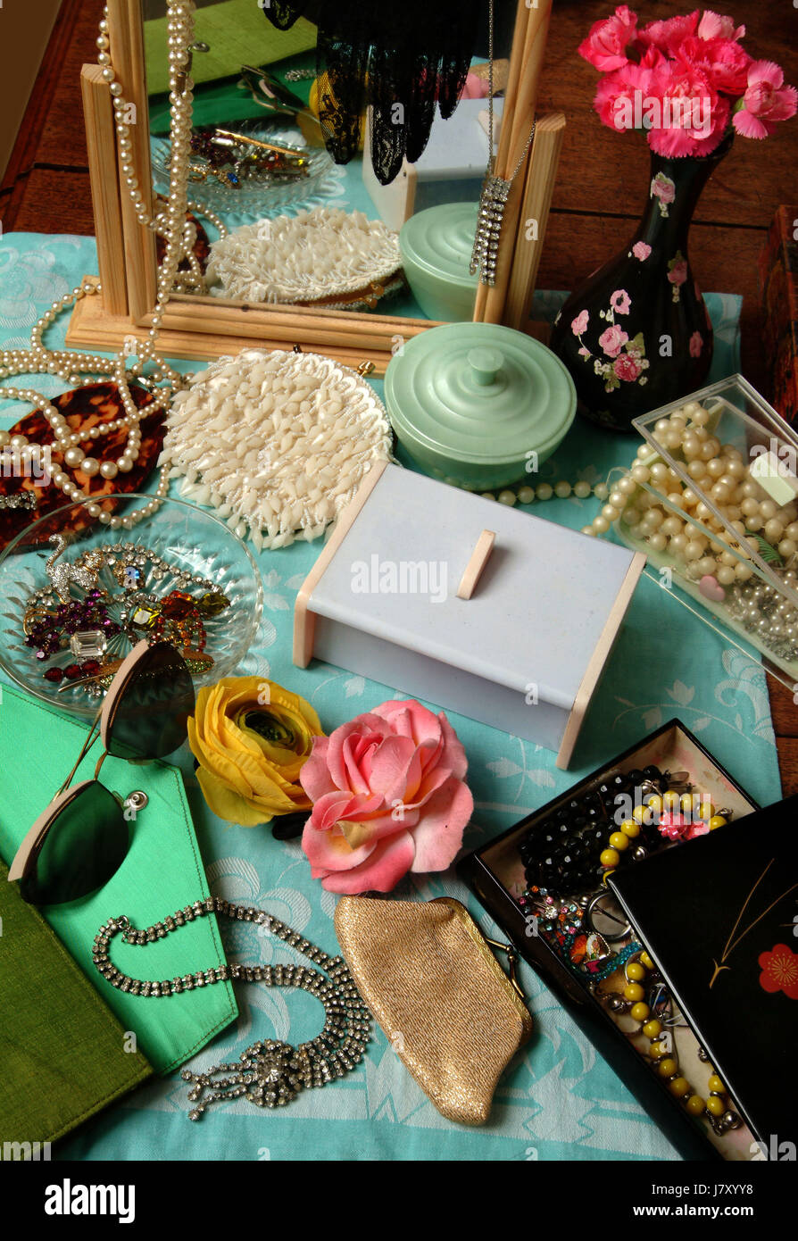 A selection of British items from the 1940's to the 1960's including kitchenware, jewelery, cushions, fashion etc. Stock Photo