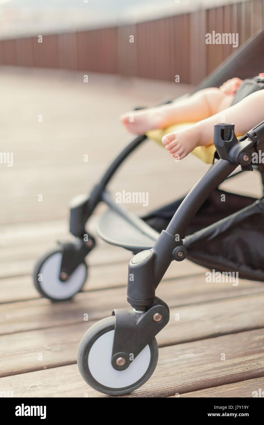 Baby sleeping in stroller outdoors Stock Photo Alamy