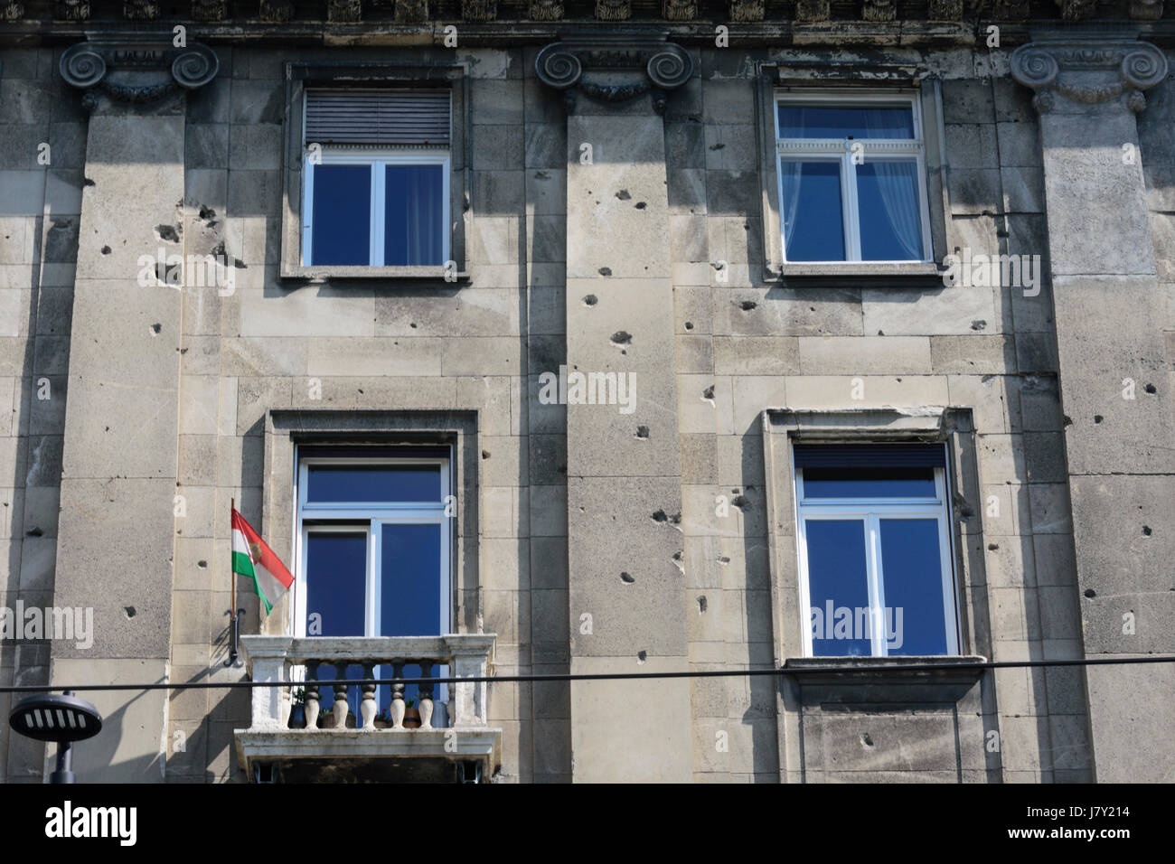 Hungary, Budapest. Bullet holes in a building next to Parliament building, Remains of the anti communist uprising of 1956 Stock Photo