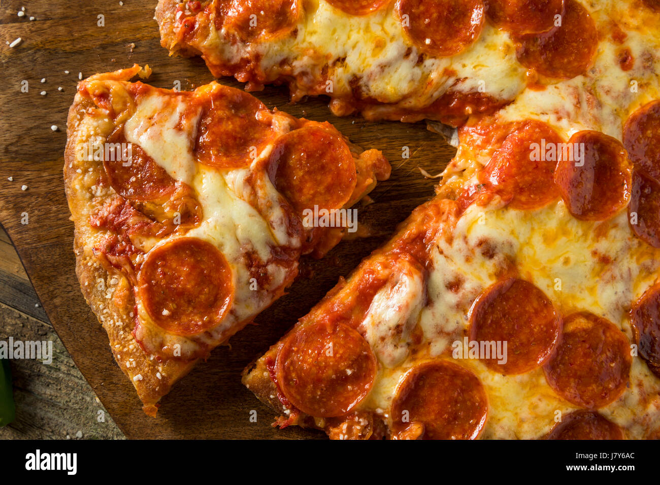 Homemade Pepperoni Pretzel Crust PIzza with Salt and Cheese Stock Photo