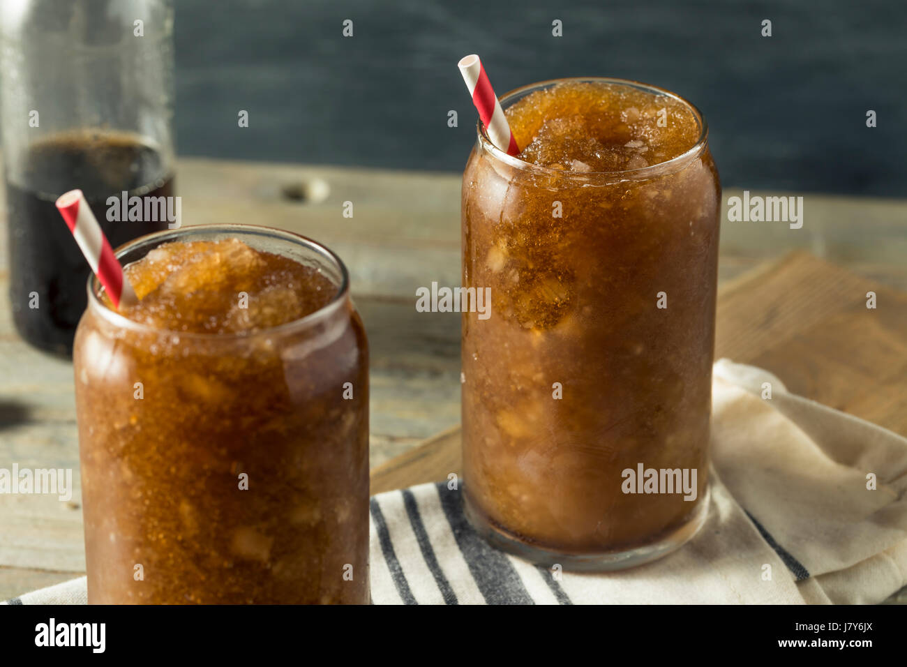 Frozen Homemade Soda Pop Slushy Drink with a Straw Stock Photo