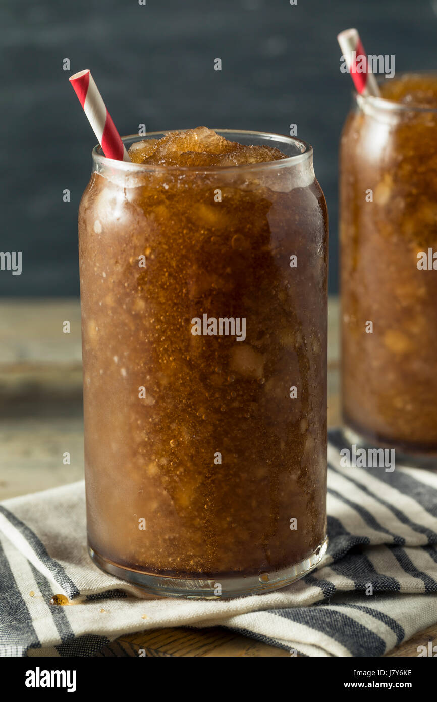 Frozen Homemade Soda Pop Slushy Drink with a Straw Stock Photo