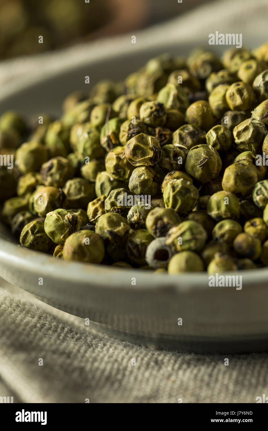 Raw Green Organic Peppercorns Ready to Cook With Stock Photo Alamy