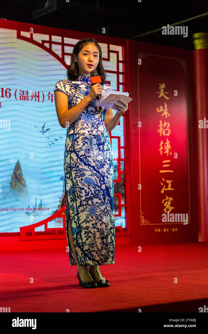 Wenzhou, Zhejiang, China.  Young Chinese Master of Ceremonies at a Dinner Meeting. Stock Photo