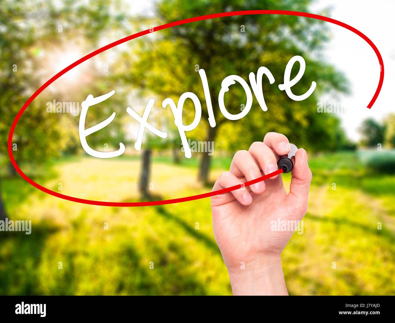 Man Hand writing Explore with black marker on visual screen. Isolated ...