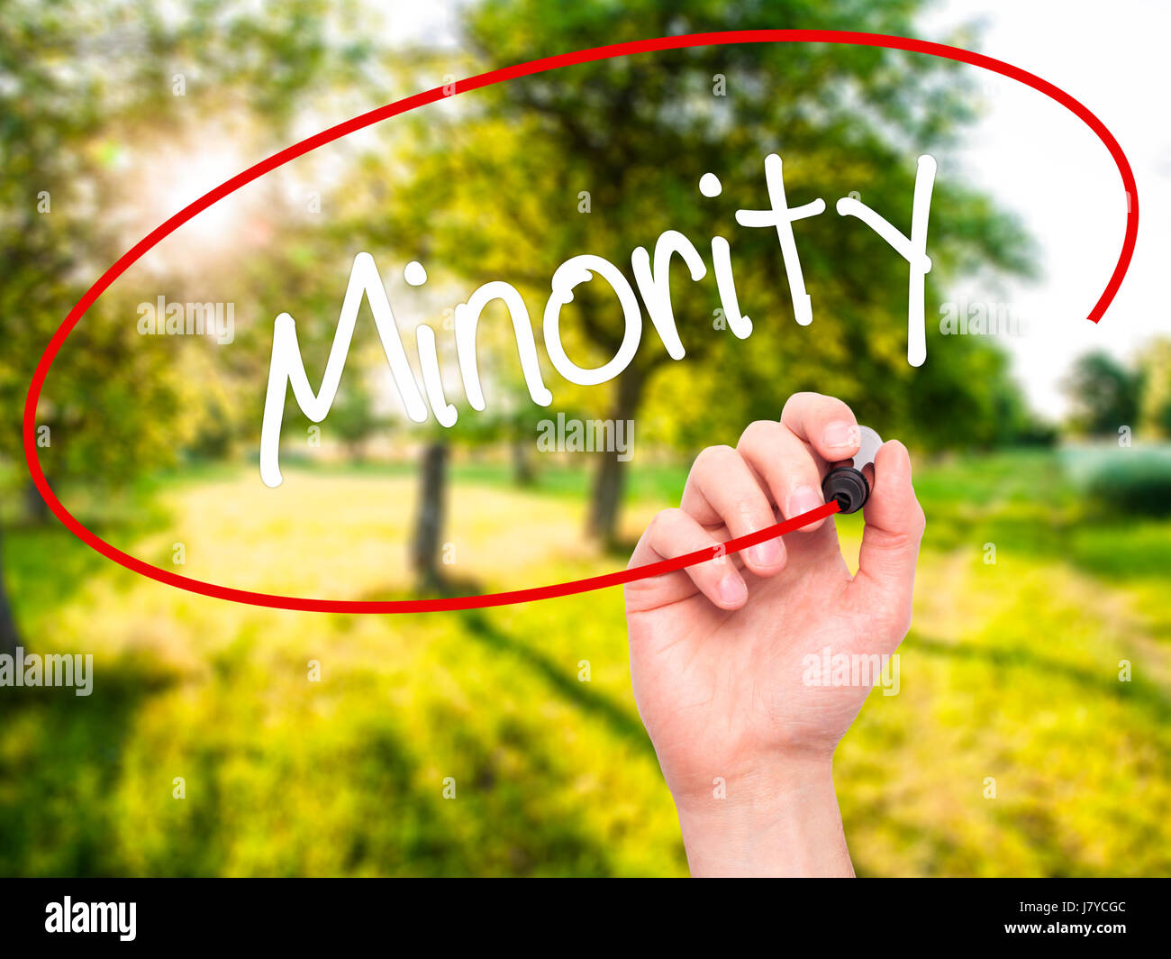 Man Hand writing Minority with black marker on visual screen. Isolated ...