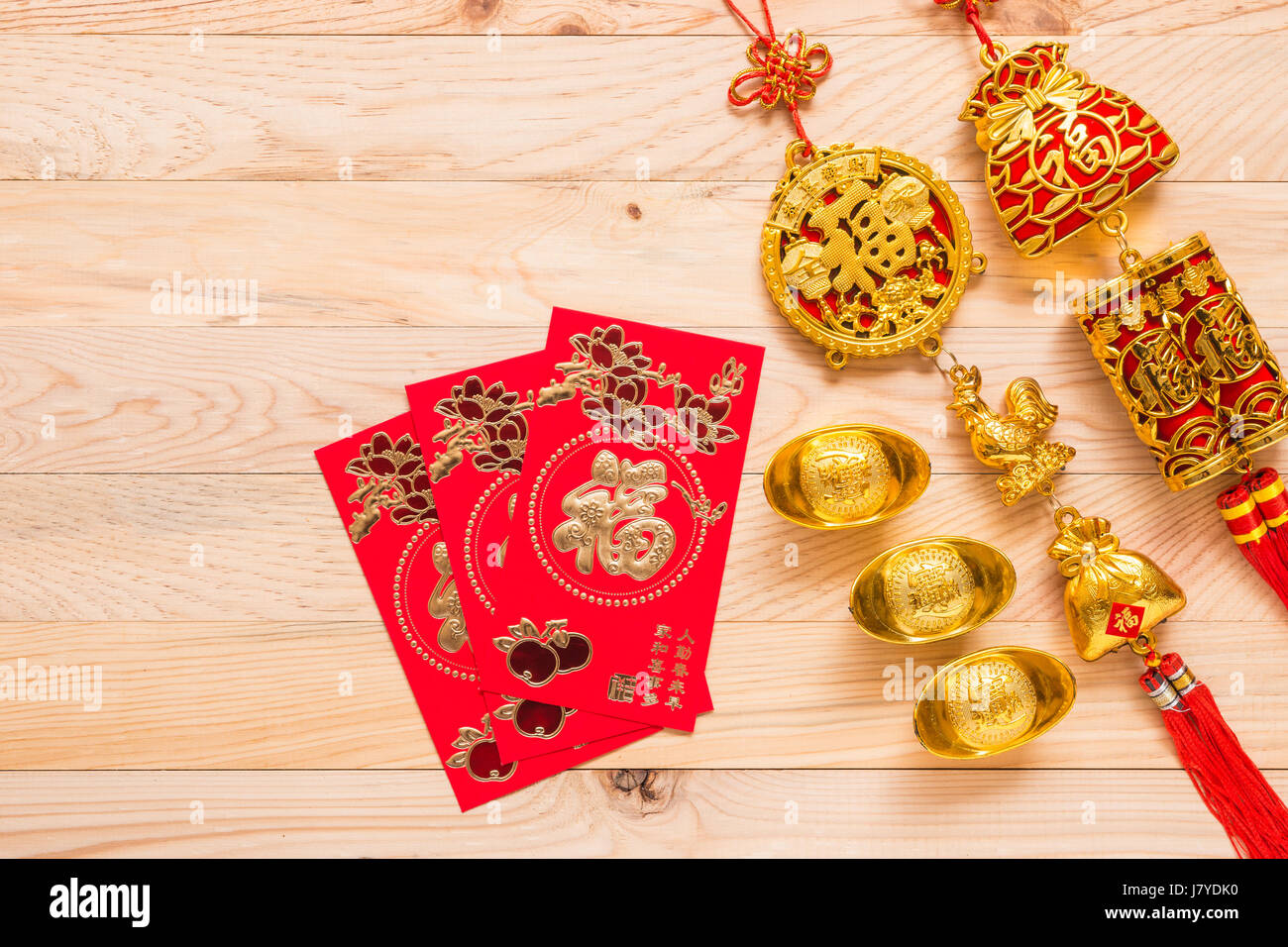 Chinese Red Envelope use in Chinese new year festival on white. Translation  in English meaning lucky and richly, Stock image