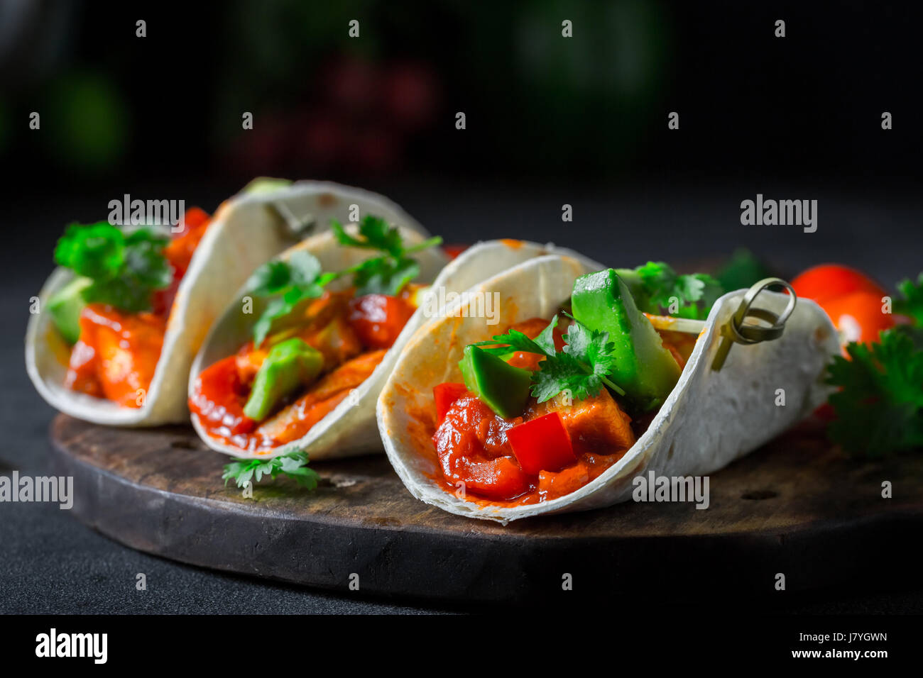Mexican tacos with spicy sauce and fresh coriander Stock Photo Alamy