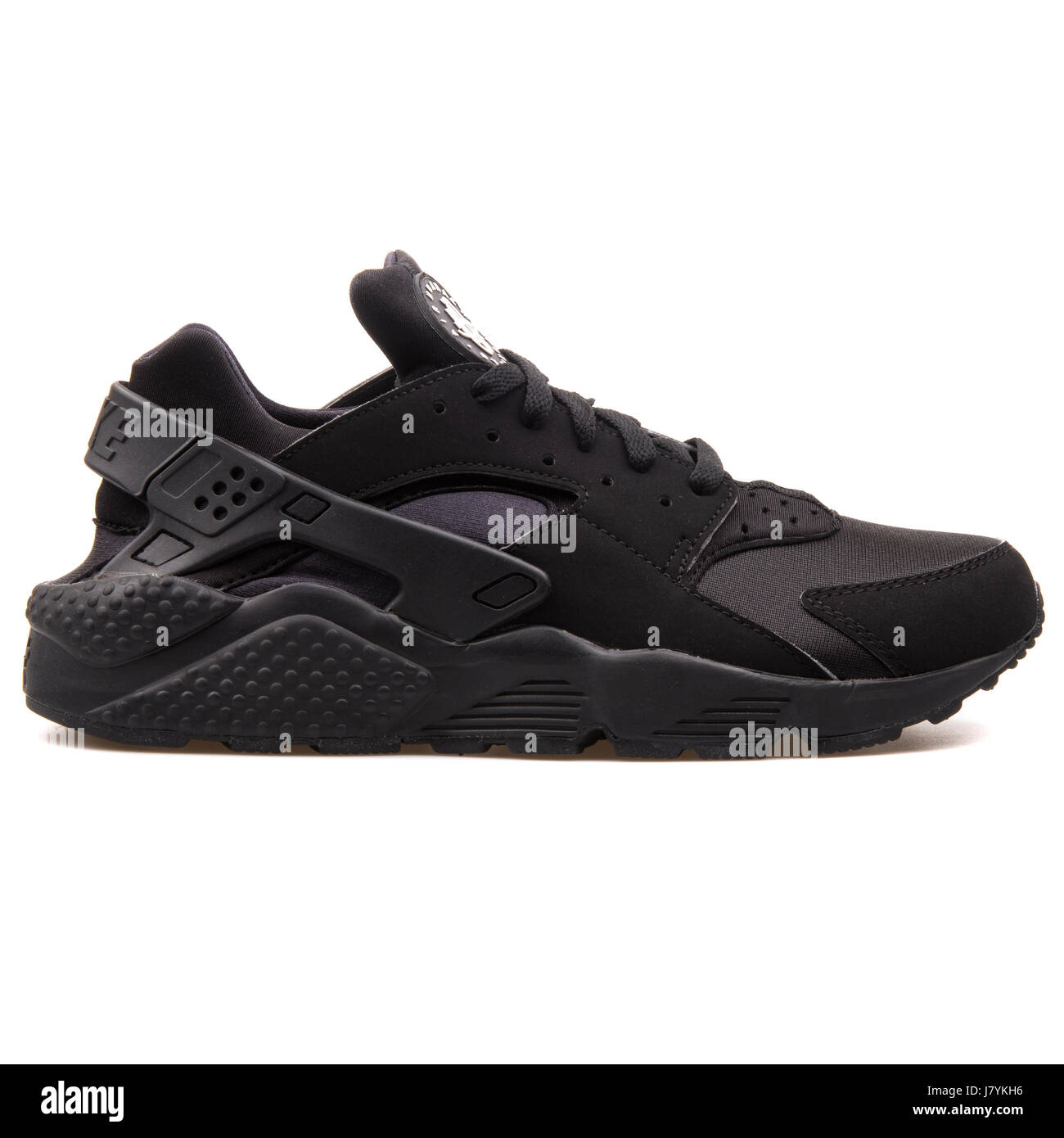 Nike Air Huarache Men Black Running Sneakers - 318429-003 Stock Photo -  Alamy