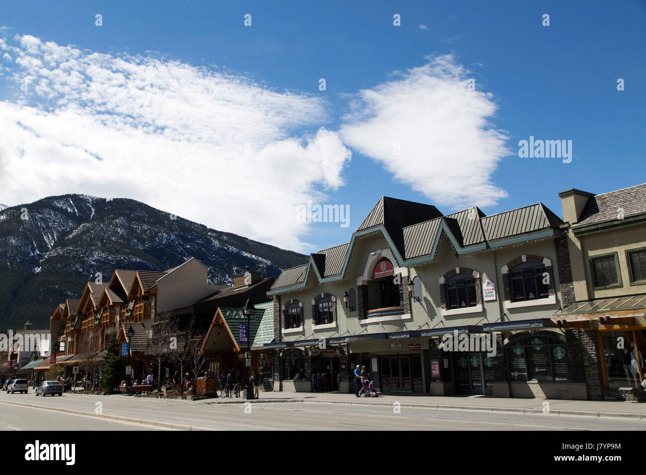 Shops on Banff Avenue in Banff, Canada. The street is Banff's main thoroughfare. Stock Photo