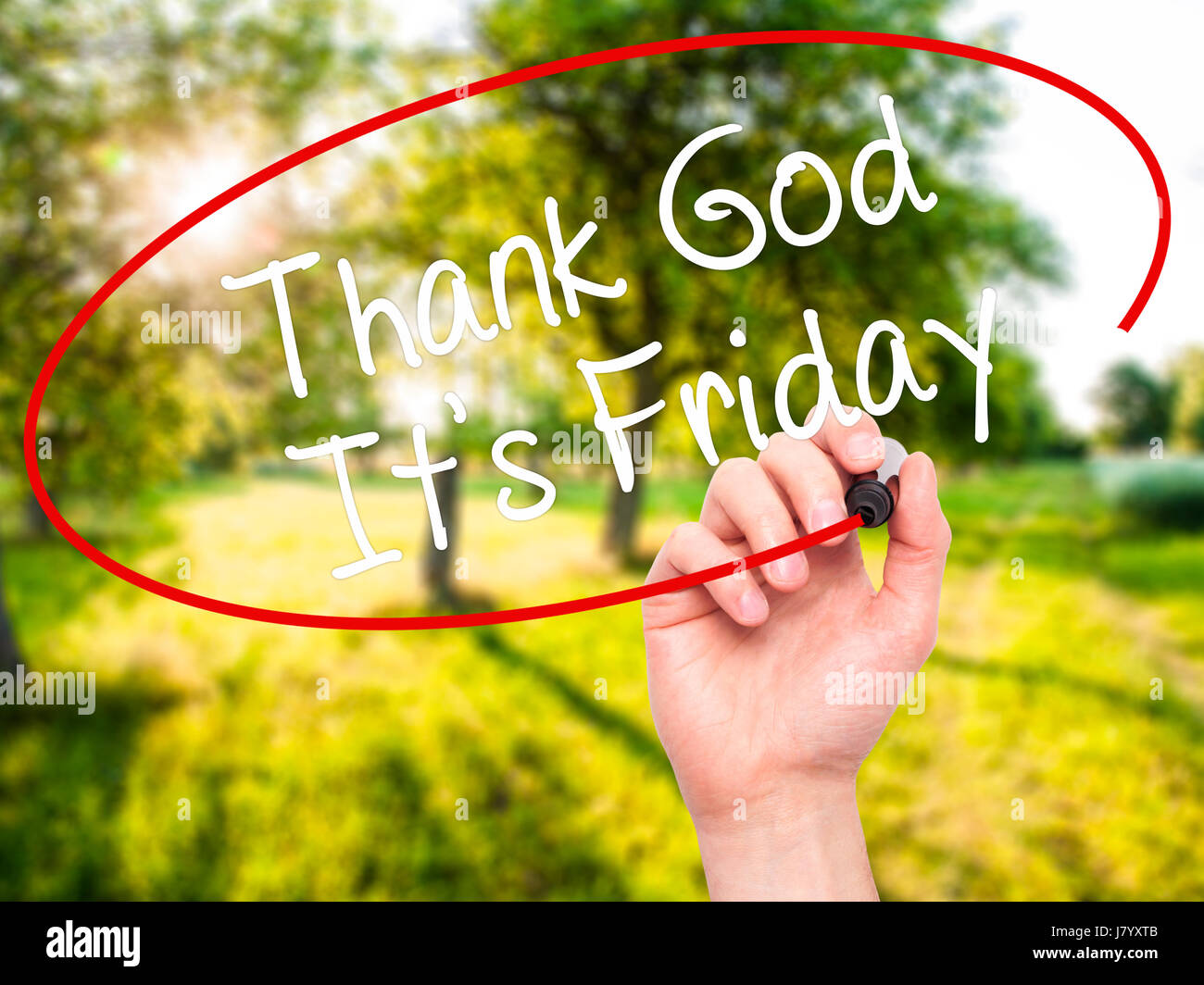 Man Hand writing Thank God It's Friday with black marker on visual ...