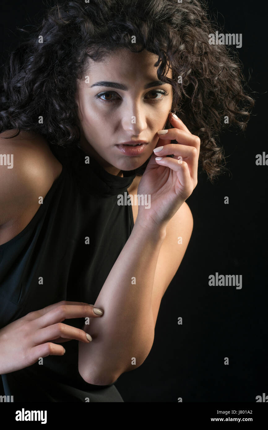 Beautiful young woman hands touching face Stock Photo - Alamy