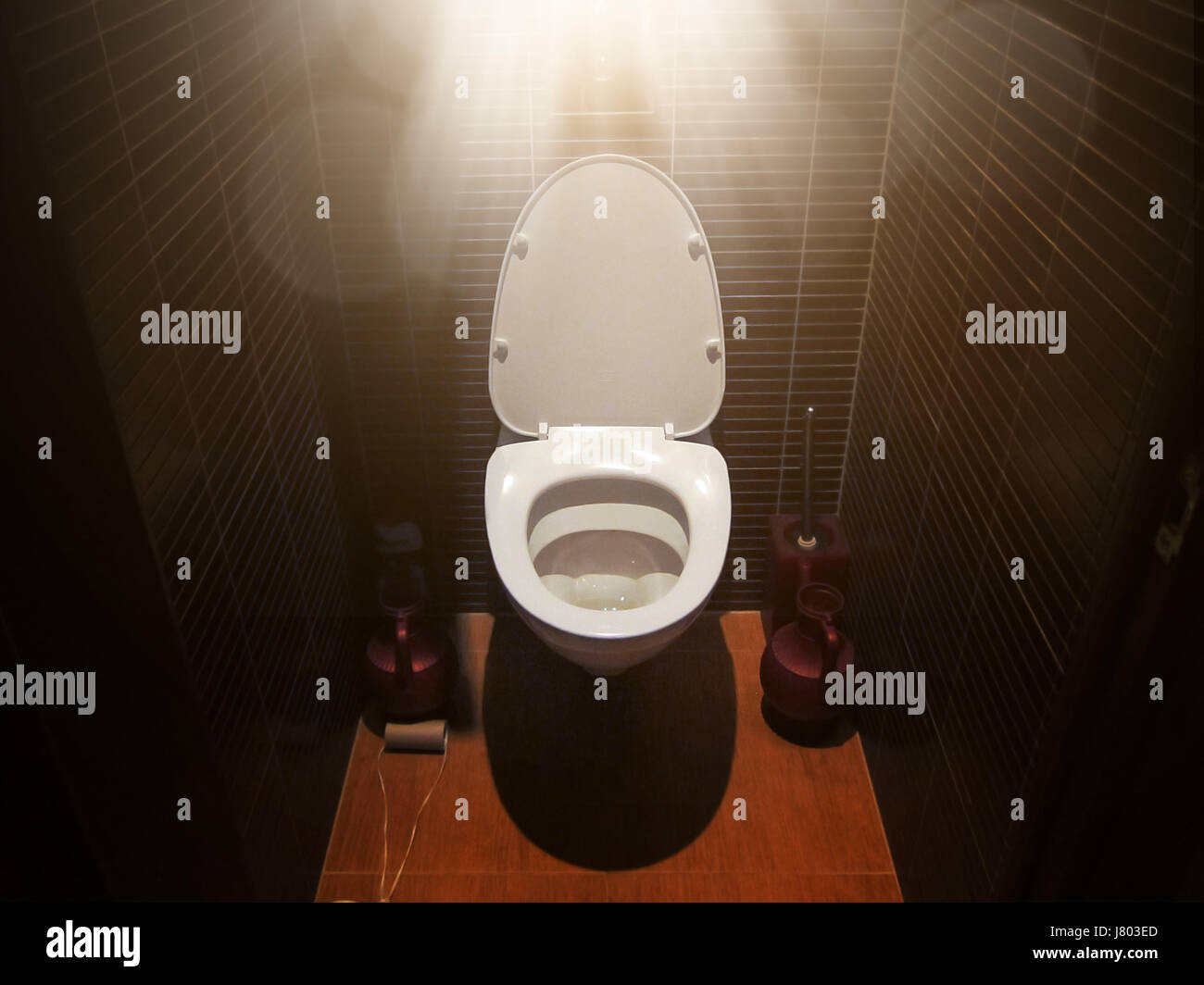 Toilet in the bathroom with sunlight, a dream to go to the toilet Stock