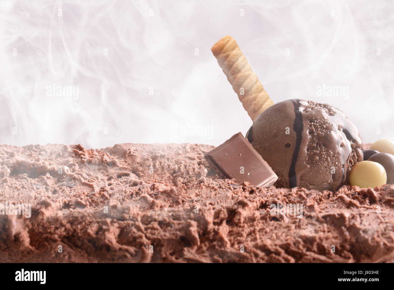 Choco ice cream ball on ice cream container. Front view of ice cream