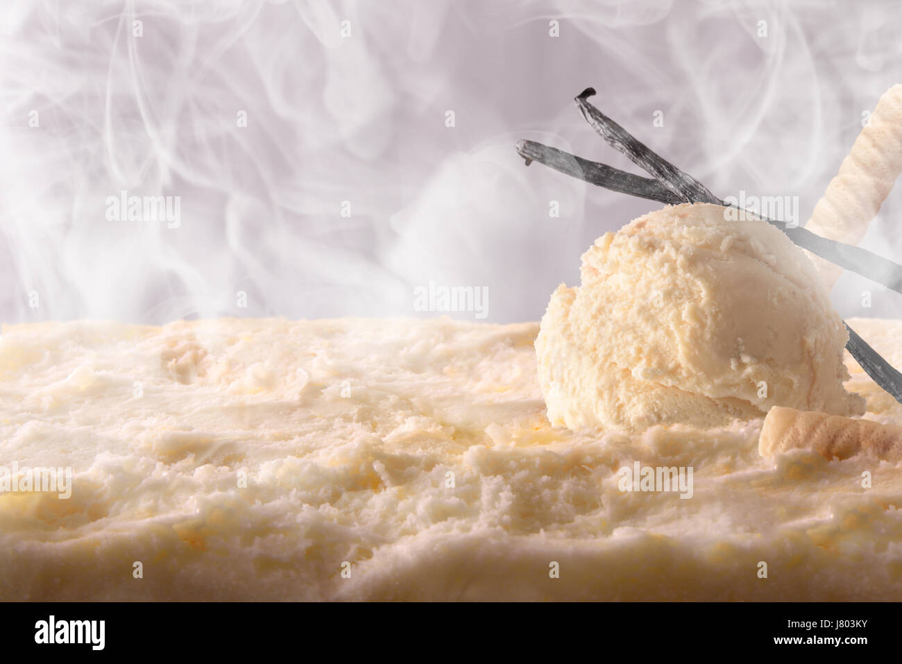 Vanilla ice cream ball on ice cream container. Front view of ice cream