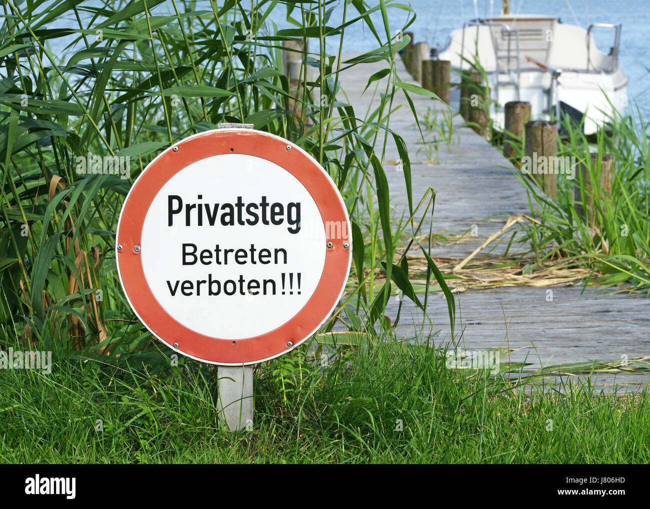 sign signal private danger plant sail harbor grasses transport bridge signposts Stock Photo