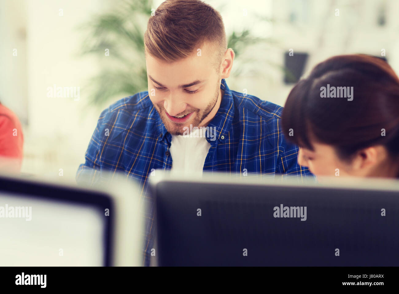 happy creative team or students working at office Stock Photo - Alamy