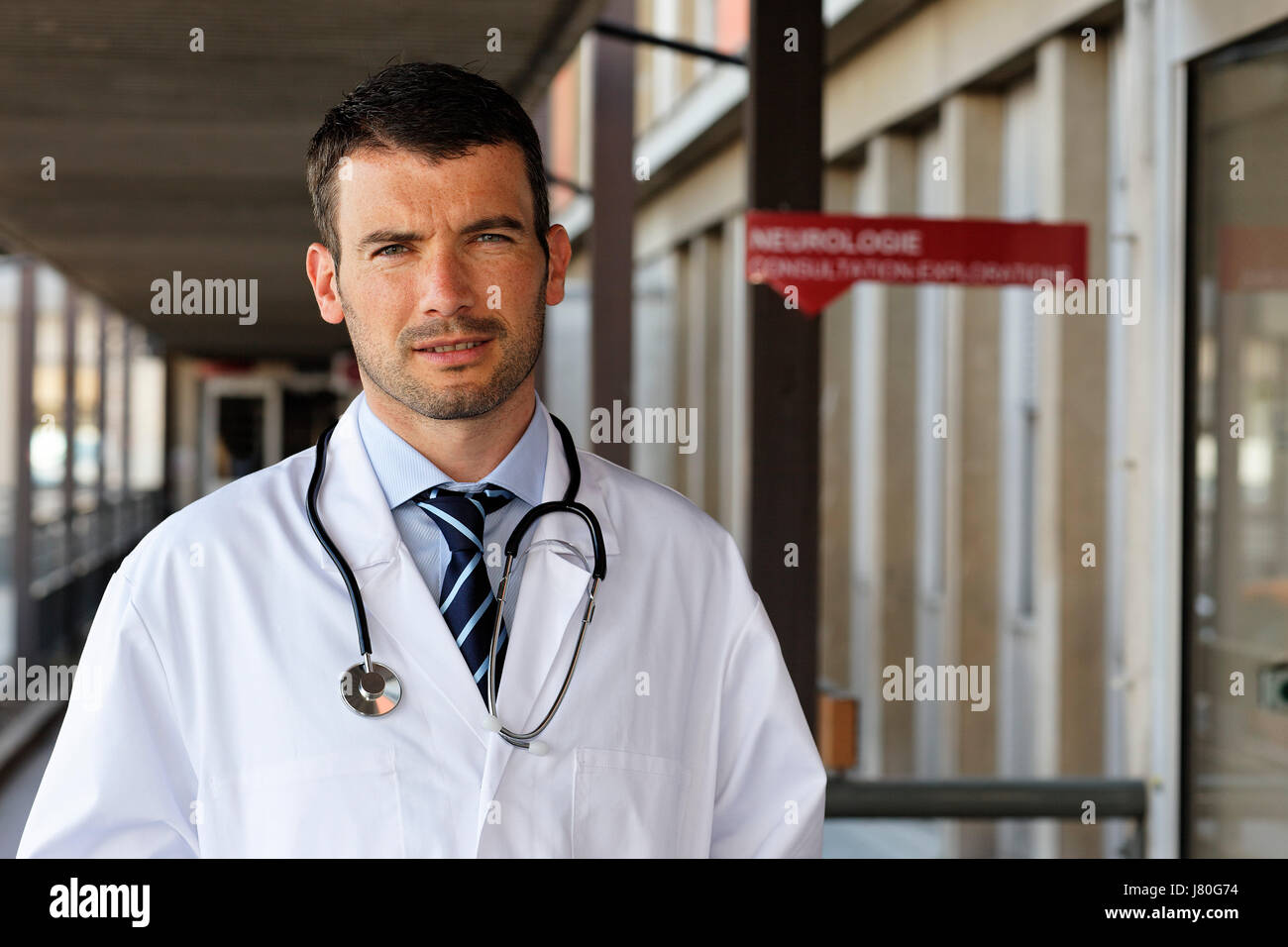 Doctor with smock and tie hi-res stock photography and images - Alamy