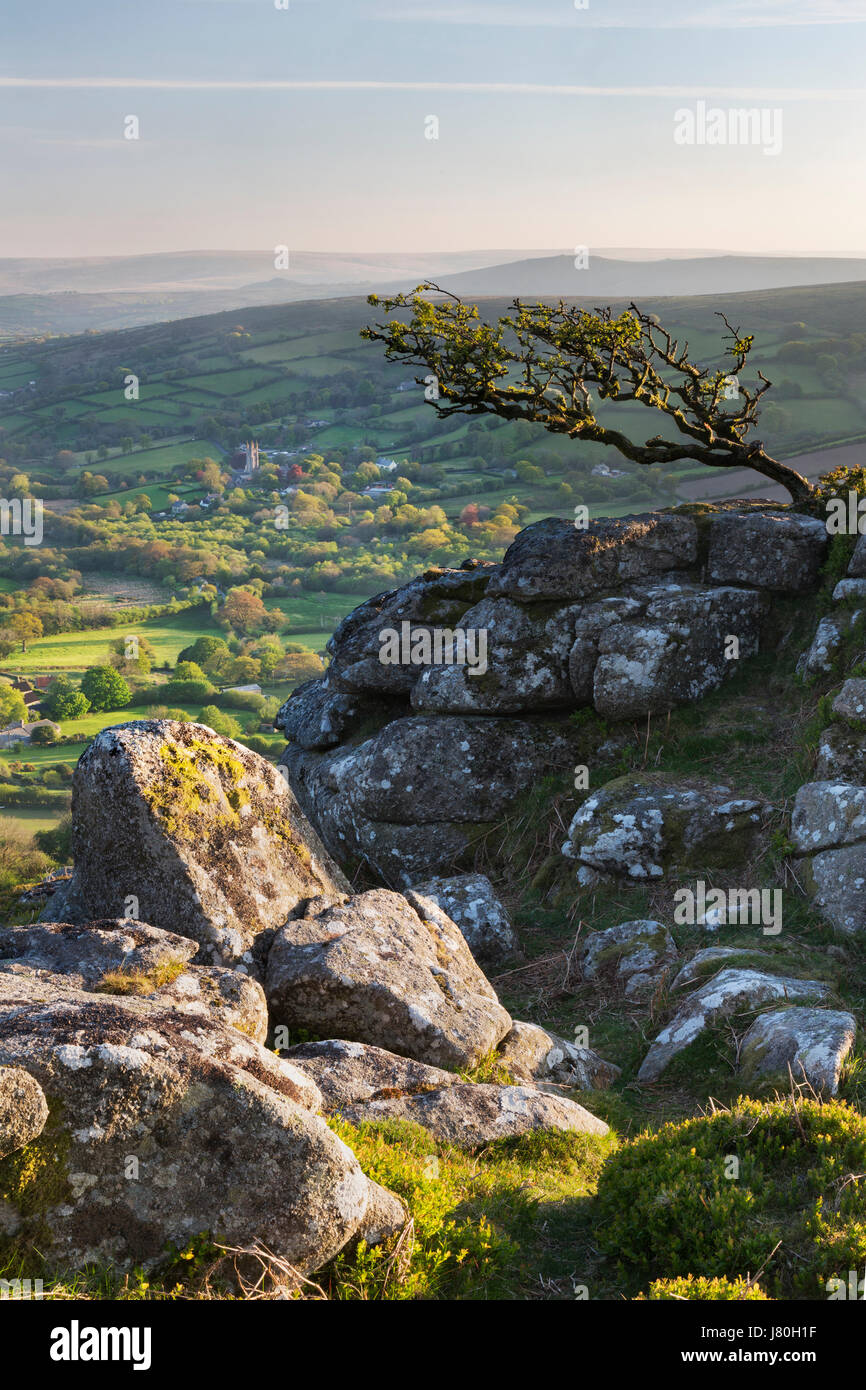 View to Widecombe-in-the-Moor from Chinkwell Tor on Dartmoor Stock Photo