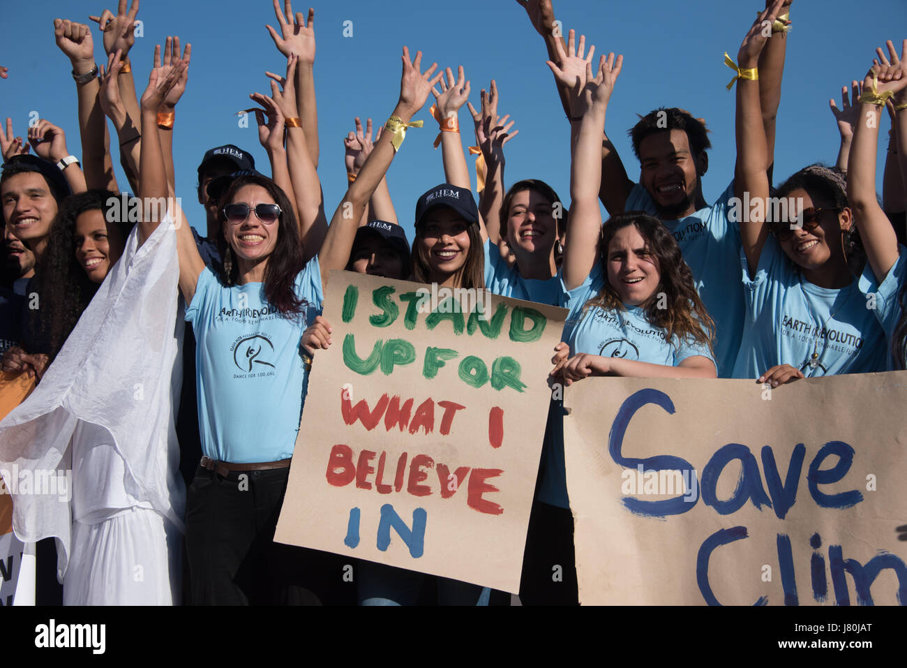 Young activists at the COP22 UN climate conference hold a sign reading 'I Stand Up For What I Believe In' at a demonstration in Jemaa el-Fnaa, the central market plaza in Marrakech, Morocco, November 10, 2016. Stock Photo