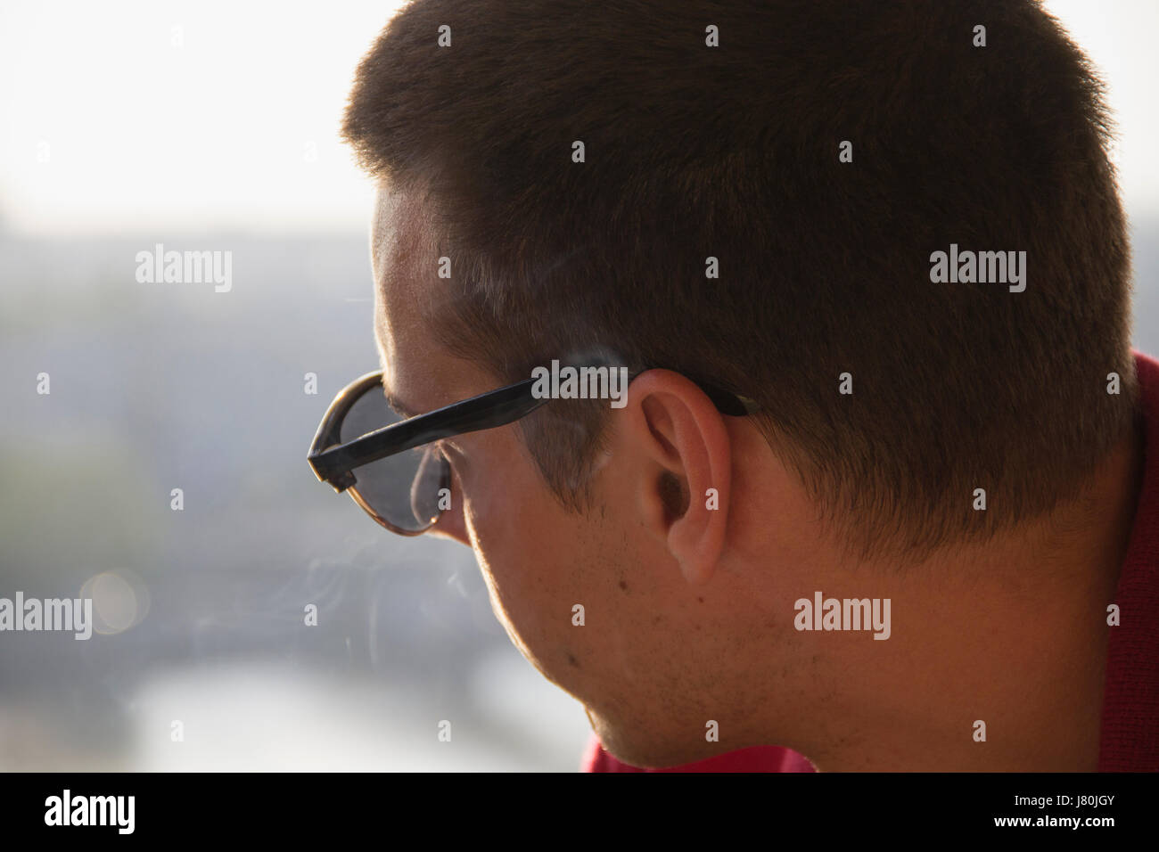Portrait Of A Young Man With Sunglasses Stock Photo - Alamy