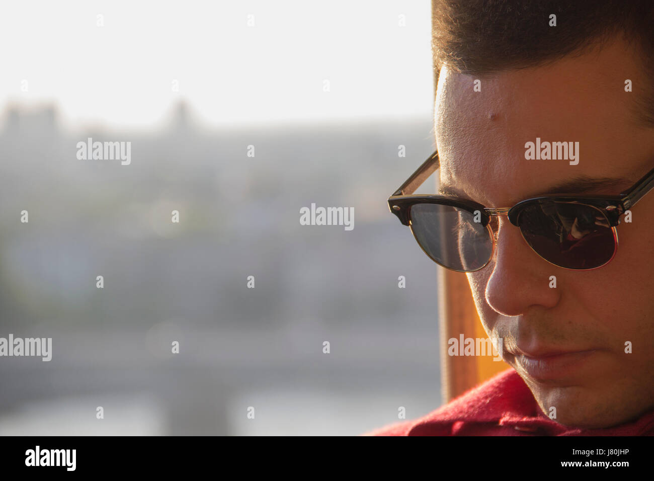 Portrait Of A Young Man With Sunglasses Stock Photo - Alamy