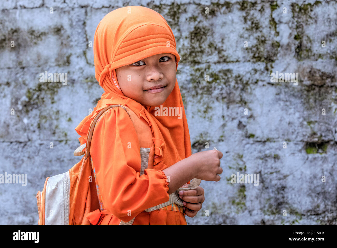 girl in traditional school uniform in Magelang, Borobudur, Java ...