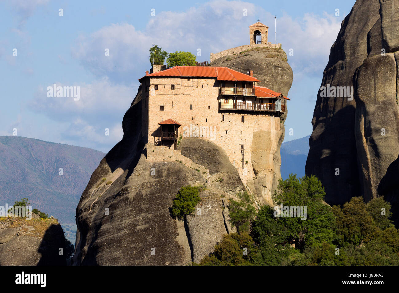 Scenic view of St. Nikolaos Anapafsas Monastery on a monolithic pillar in Meteora, Greece Stock Photo