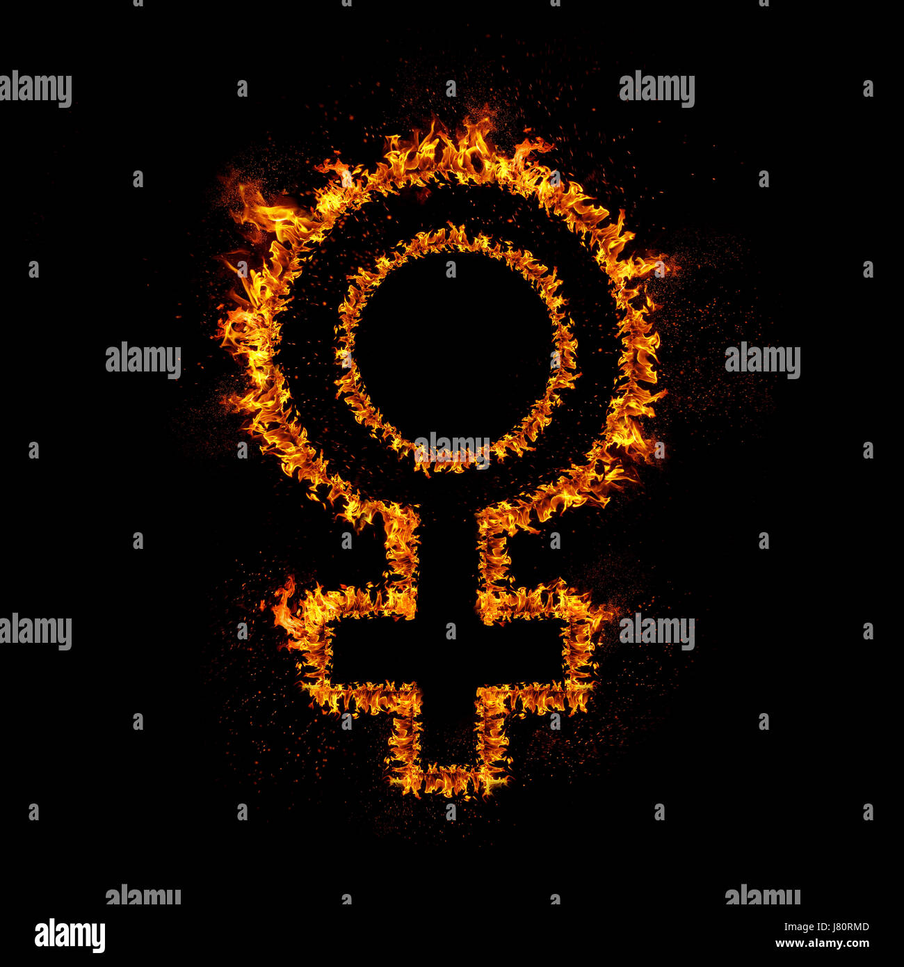 Female sign burning in flames, isolated on black background. Stock Photo