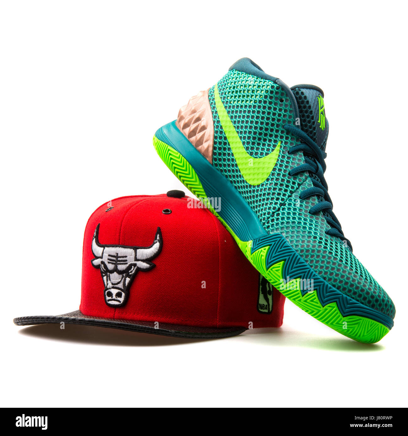 Green Nike Kyrie 1 sneaker and Mitchell & Ness Red Chicago Bulls Cap Stock  Photo - Alamy