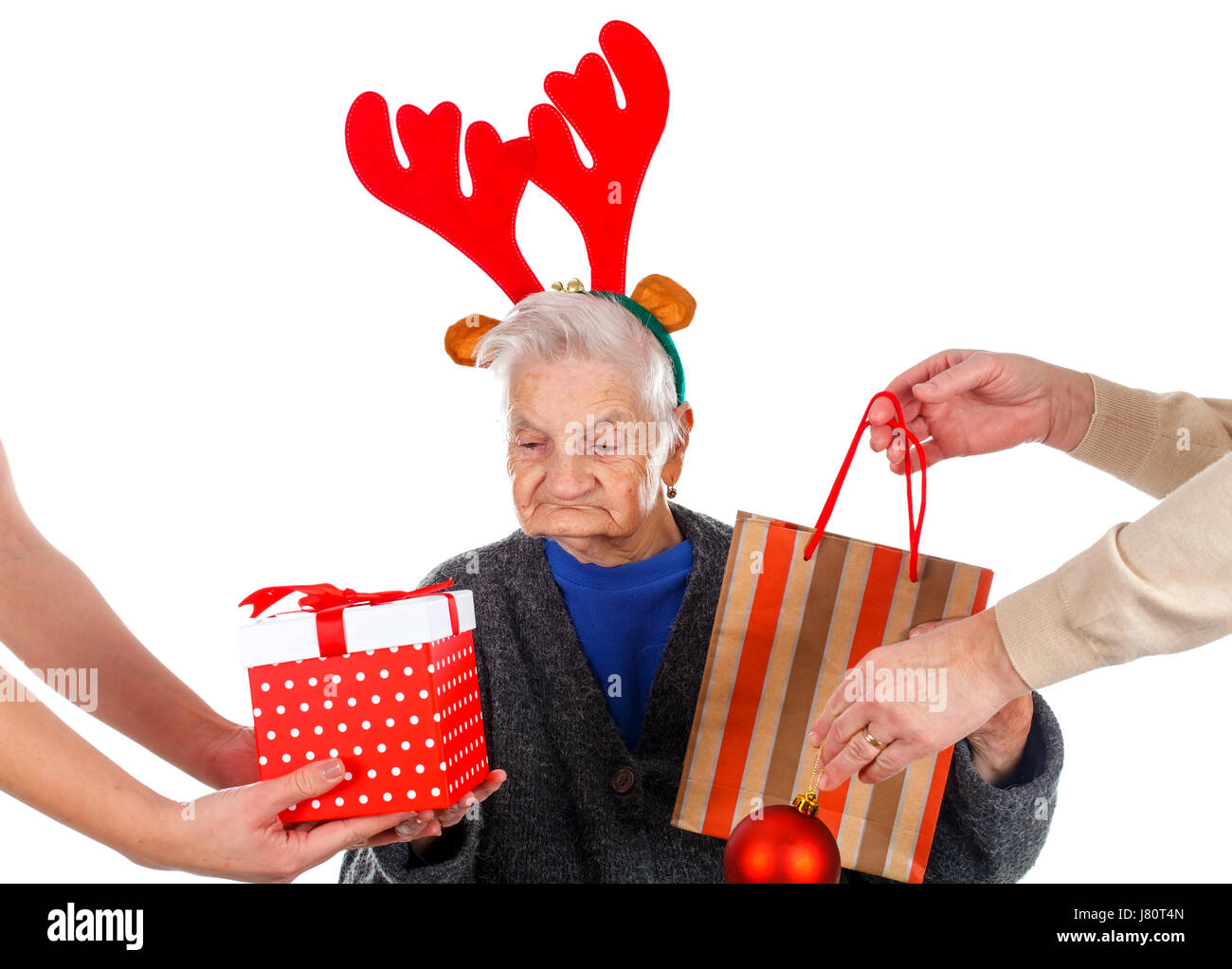 old lady receiving Christmas gifts from 