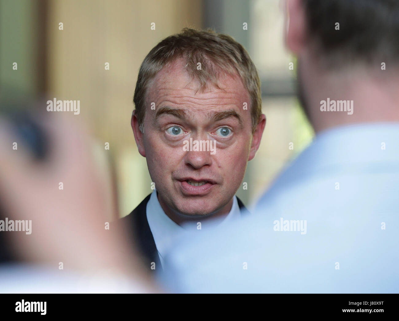 Liberal Democrat leader Tim Farron speaks to the media as he visits the Tim Parry &amp; Johnathan Ball Foundation for Peace, during a General Election campaign event in Warrington. Stock Photo