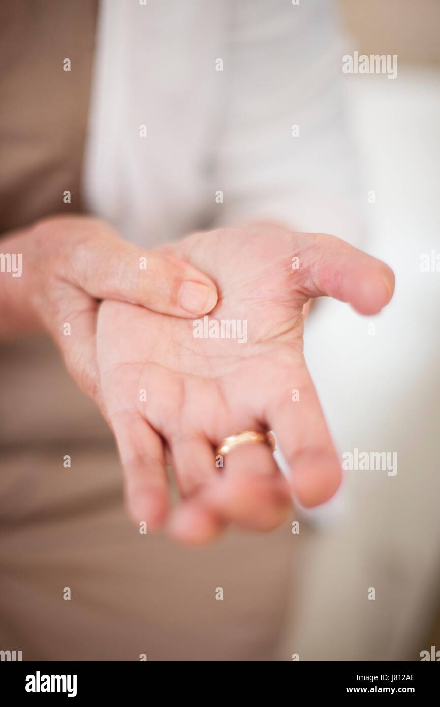 Woman with hand pain. Stock Photo