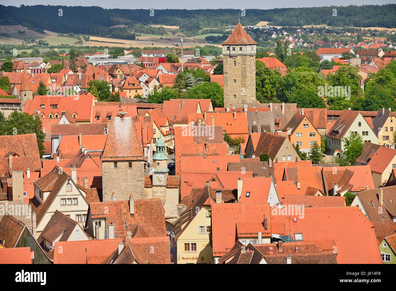 Germany, Bavaria, Rothenburg ob der Tauber, Marks Tower and Roeder Arch from Town Hall Tower with Roeder Gate in the background. Stock Photo