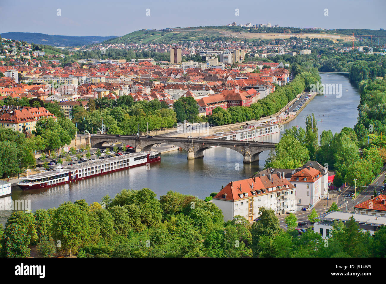 Germany, Bavaria, Wurzburg, View eastwards from Festung Marienburg fortress over the River Main with cruise boats. Stock Photo