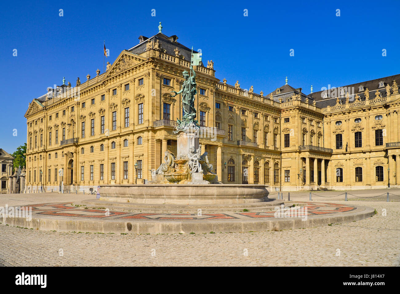 Germany, Bavaria, Wurzburg, Wurzburg Residenz or Residence Palace facade with the Franconia Fountain. Stock Photo