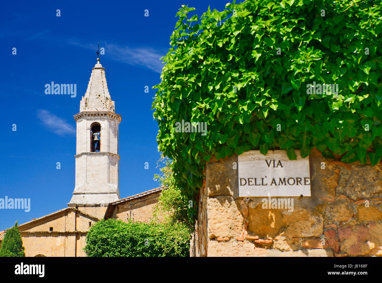 Italy, Tuscany, Val D'Orcia, Pienza, The belltower of the Duomo built in 1459 by the architect Bernardo il Rossellino for Pope Pius II seen from the V Stock Photo