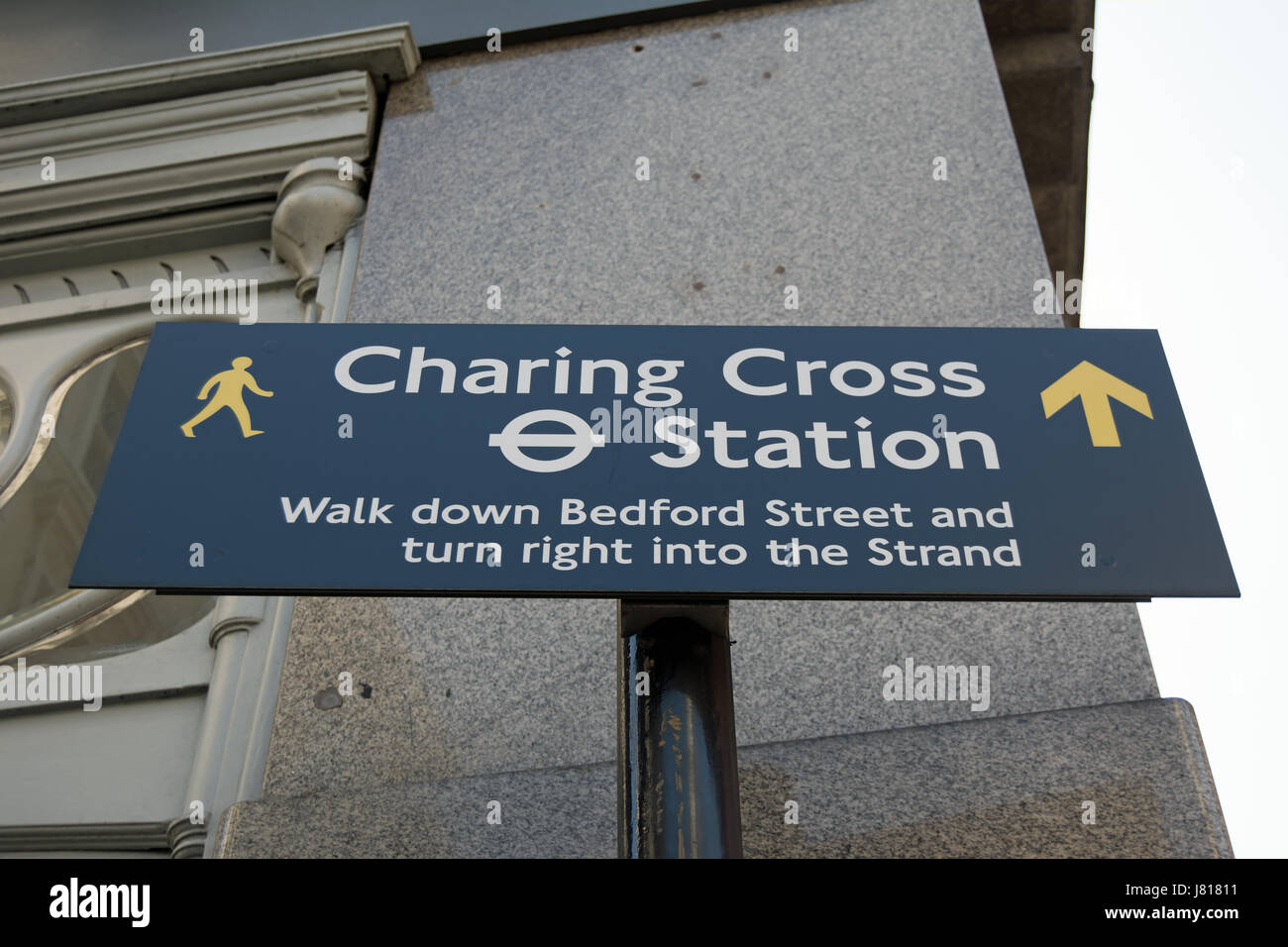 wayfinding sign giving directions to charing cross station, in covent