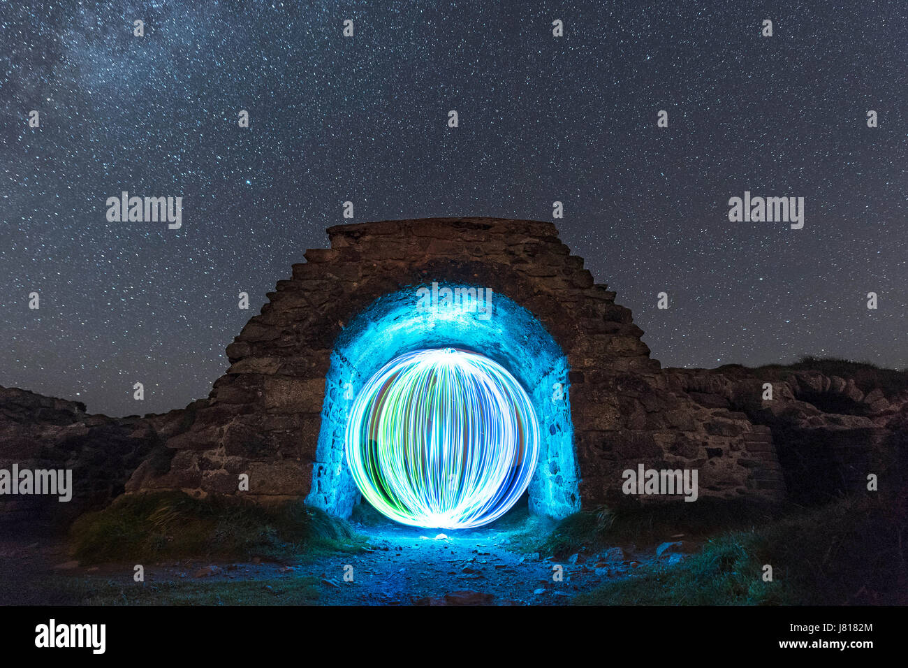 Light Painting Orb in a Cave - Botallack Mine, United Kingdom Stock Photo